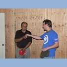 thumbnail Michael Harris hands the keys to the new building to the pastor.